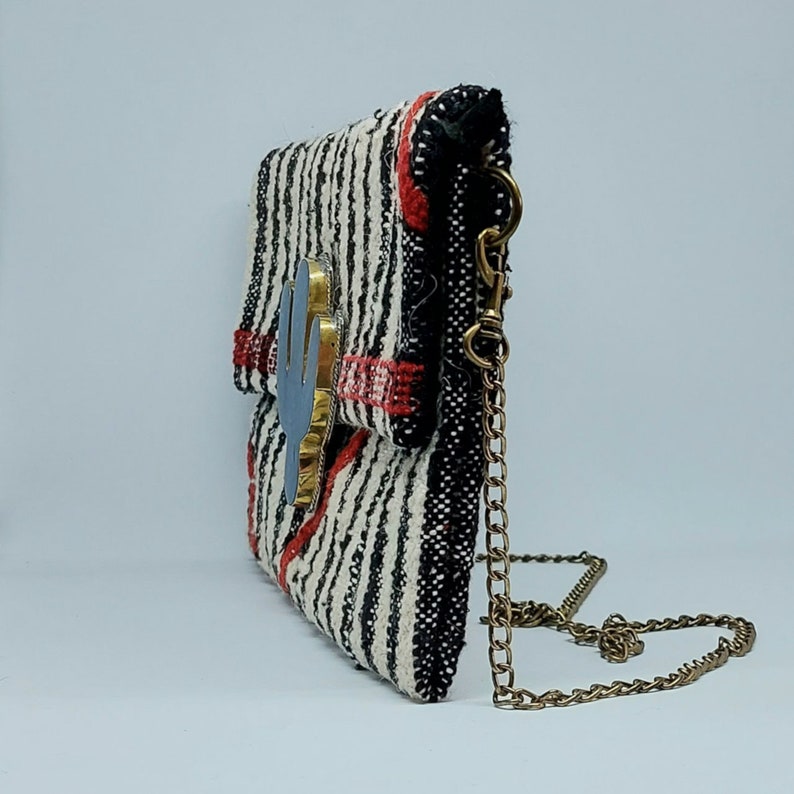 Handcrafted Berber Carpet Clutch: Moroccan Essence