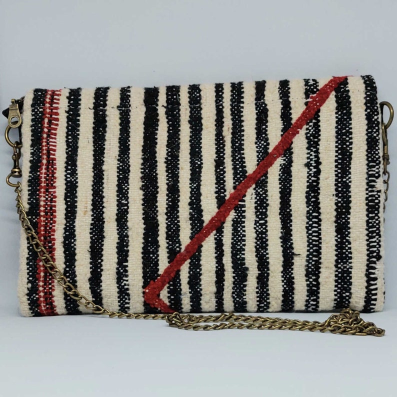 Handcrafted Berber Carpet Clutch: Moroccan Essence